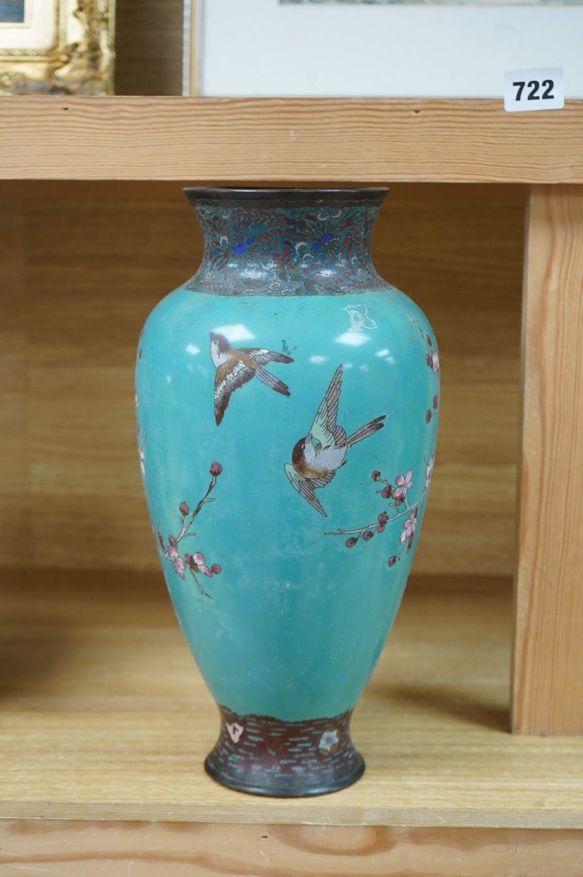 A Japanese cloisonne vase enamelled with birds amongst blossom, 31cm high